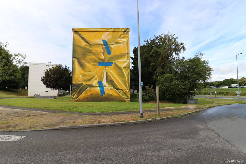 3d-mural-morlaix-wrapped-building-yellow-paper-tape
