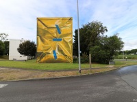 3d-mural-morlaix-wrapped-building-yellow-paper-tape