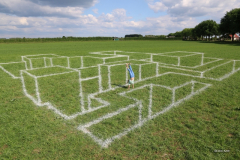 Anamorphosis chalk on grass